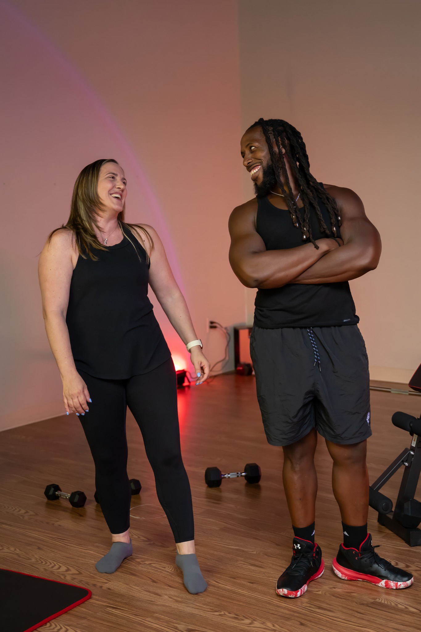 Alicia and Sharif sharing a light moment in the studio